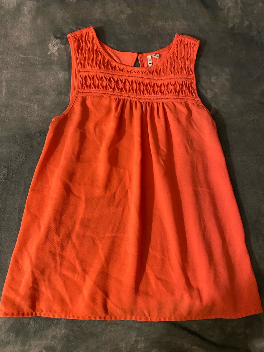 Elle coral Smocked Sleeveless Top